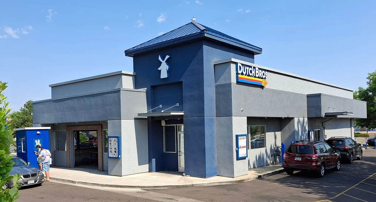 A Dutch Bros Coffee drive-thru building in Littleton, Colorado